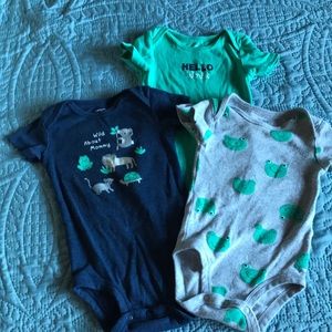 3 Carter’s boy’s short sleeve body suits w/animals